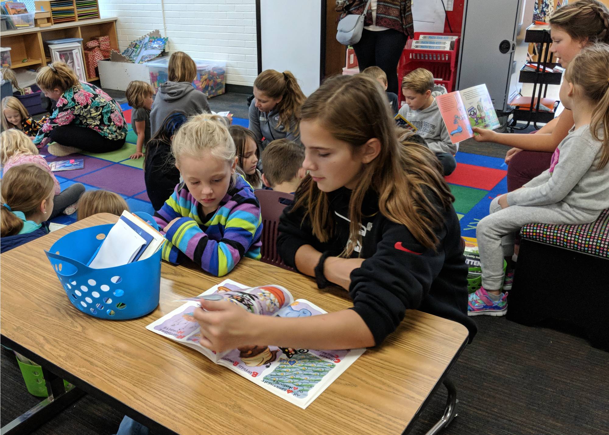 Students from Central Woodlands read to students from Grandville Central Elementary